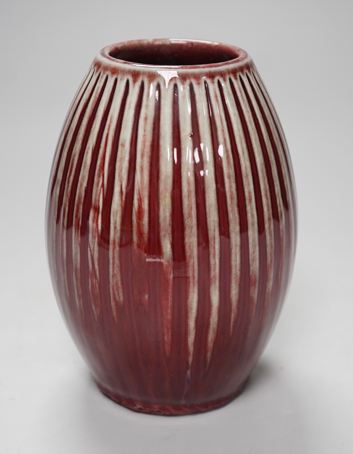 A Chinese Sang De Boeuf vase, 15cm